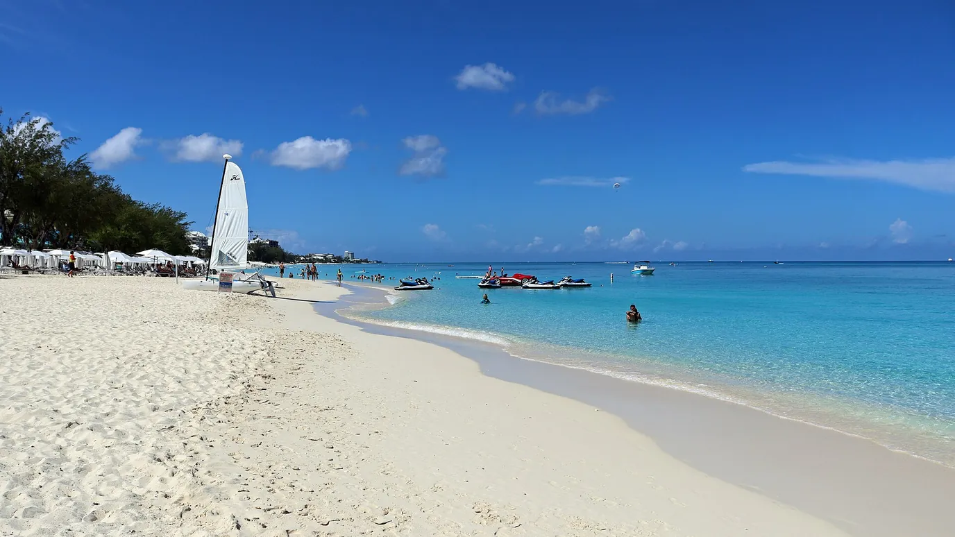 White sand and turquoise water on Seven Mile Beach, Grand Cayman.