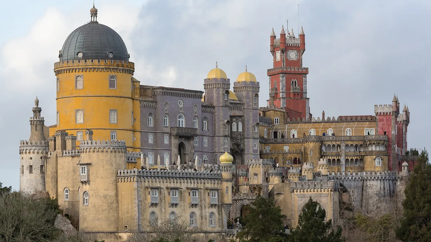 The yellow and red Pena Palace on its hilltop in Sintra.